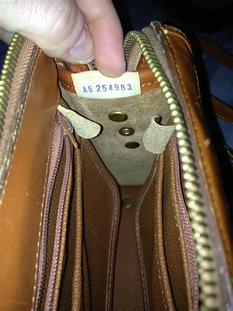 dooney and bourke bag serial number.